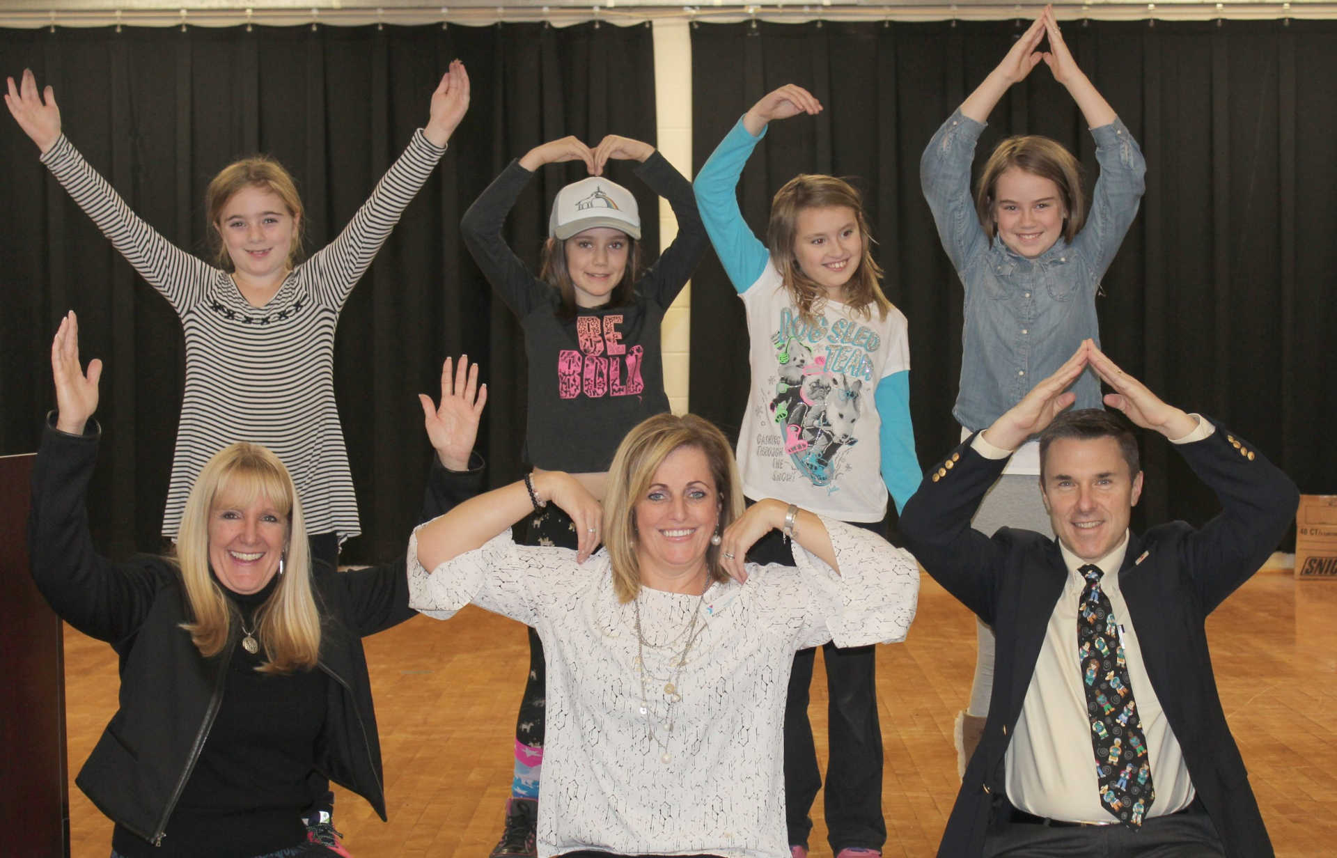 HRCCU employees volunteering at Corinth branch of the Saratoga Regional YMCA after receiving donation from Golf Classic