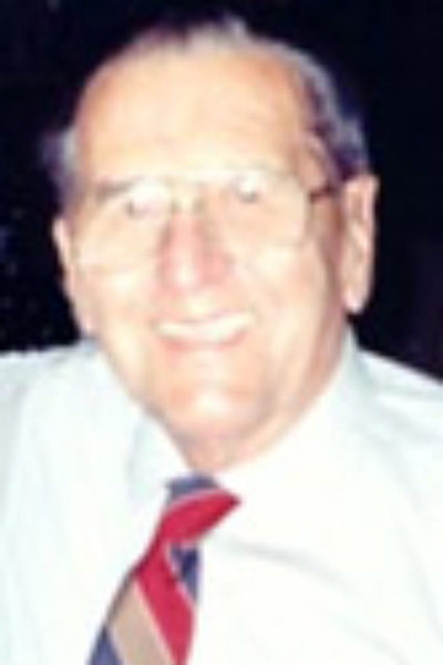 photo of previous HRCCU board president Windsor Cote, an elderly man wearing a white button down shirt
