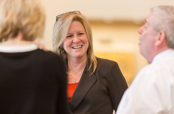 HRCCU board members mingle with members at the 64th Annual Meeting in 2018 to discuss the future of the credit union