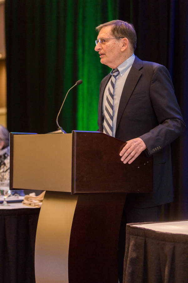 an HRCCU board member speaks at the 64th Annual Meeting in 2018 to discuss the future of the credit union