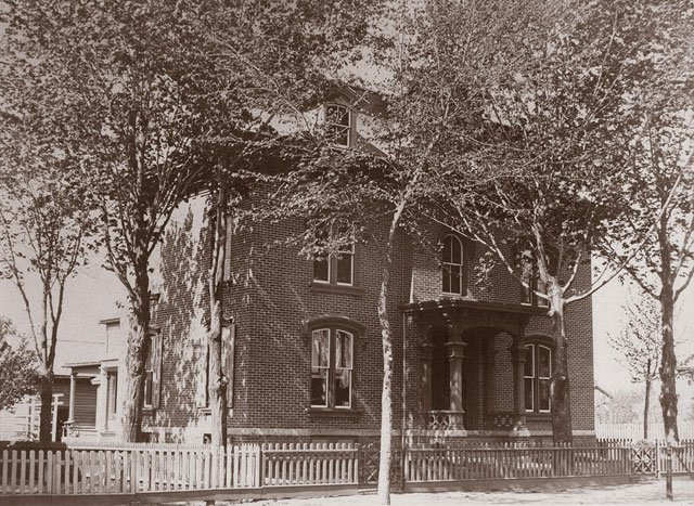 a historic photo of the DeLong House, which is now the Chapman Historical Museum in Glens Falls, New York