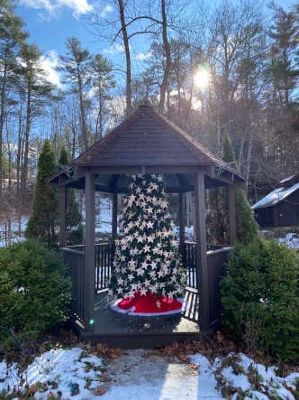 fully decorate tree in a gazebo with hand-made ornaments from HRCCU employees for the Lake Luzerne Memory Christmas Tree
