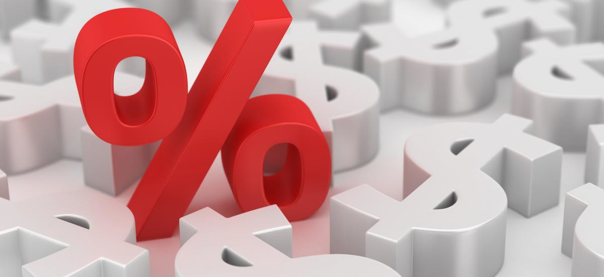 graphic with large red percentage sign representing inflation that cause interest rates for a variety of loans to increase