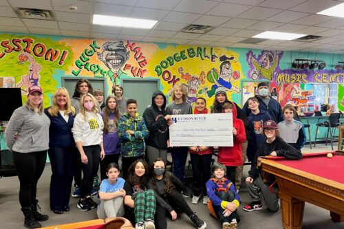 hrccu ceo presenting glens falls area youth center with donation check