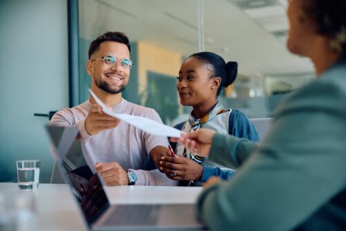 Two people having a pleasant banking experience in upstate New York.